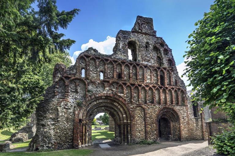 Photo of St Botolph's Priory in Colchester on a sunny day