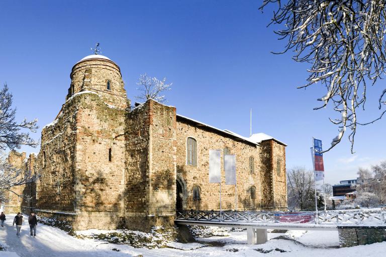 Colchester Castle in the snow on a clear sunny day