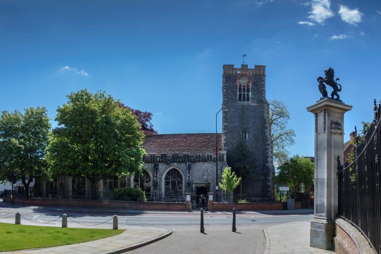A photograph of the Natural History Museum on a bright sunny day