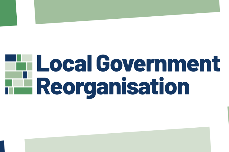 Logo with text “Local Government Reorganisation” in dark blue, next to a grid of green and blue rectangles on a white background with angled colour blocks.
