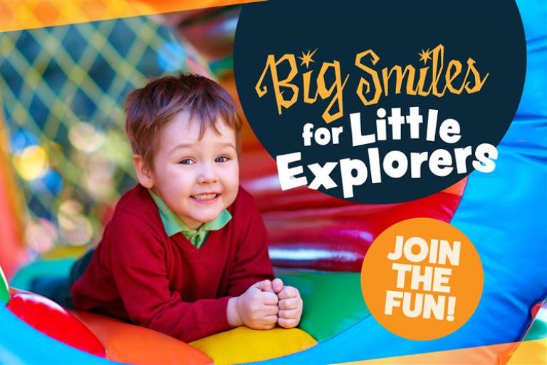 Text says "Big Smiles for Little Explorers" and "Join the Fun" in an orange circle. This text is on a image of a smiling toddler in an inflatable tunnel.