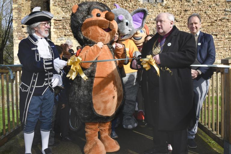 The Mayor and Town Crier cutting the ribbon outside Colchester Castle at the official launch of Beat the Street