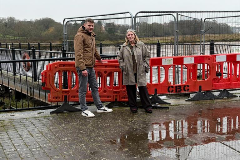 Cllr Mark Cory and Cllr Andrea Luxford Vaughan standing by Wivenhoe Jetty