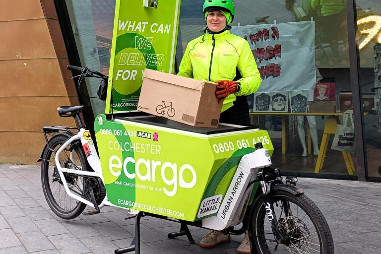 Emily Hughes standing next to an eCargo bike