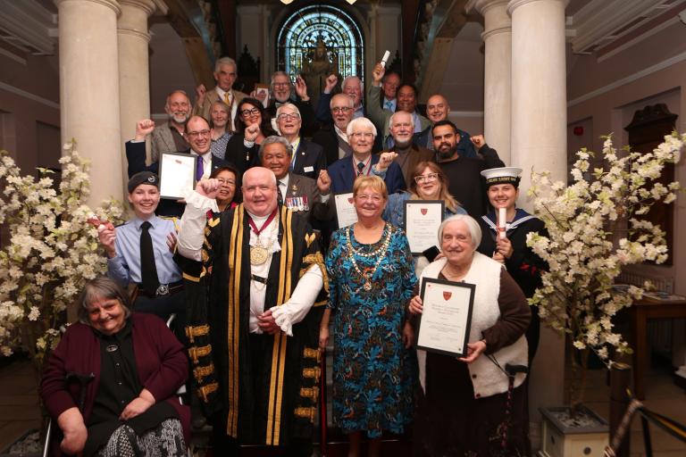 The Mayor of Colchester flanked by the winners of the 2026 Mayor's Awards