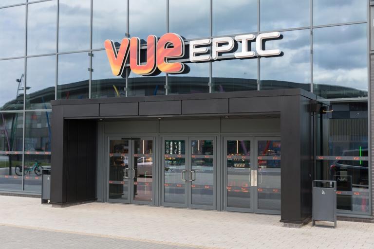 Entrance of the Vue cinema with glass frontage and VUE EPIC sign.