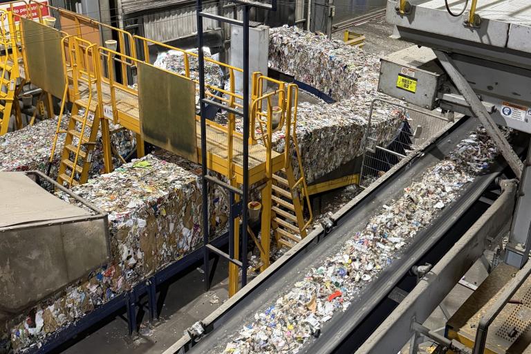 A line of sorted waste in a recycling facility