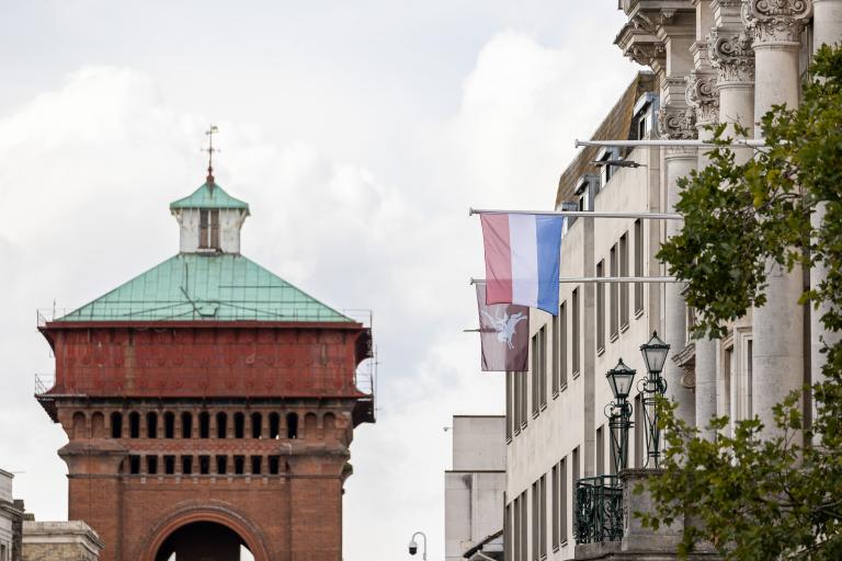 The Dutch flag and Pegasus flags flying from Colchester Town Hall