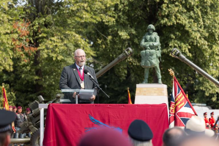 Mayor giving a speech at the unveiling of a Colchester Airborne Soldier Statue
