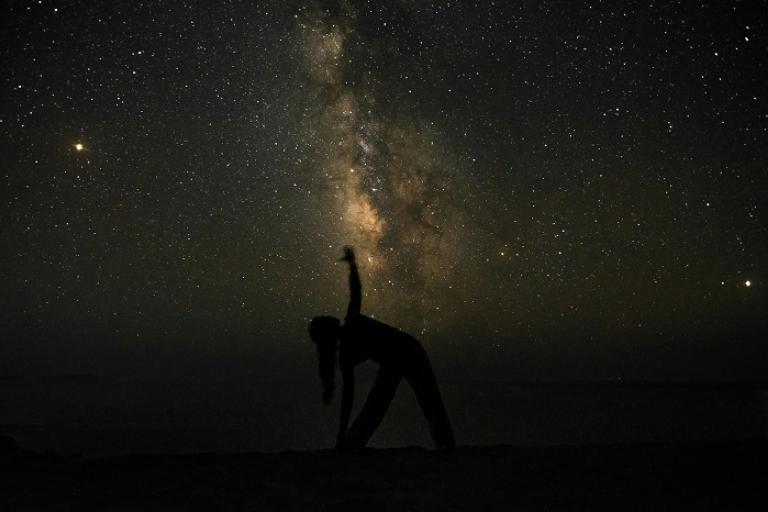 Exclusive after-hours yoga under the Gaia installation in Colchester Castle