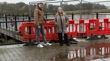 Cllr Mark Cory and Cllr Andrea Luxford Vaughan standing by Wivenhoe Jetty