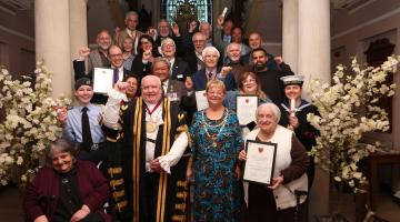 The Mayor of Colchester flanked by the winners of the 2026 Mayor's Awards