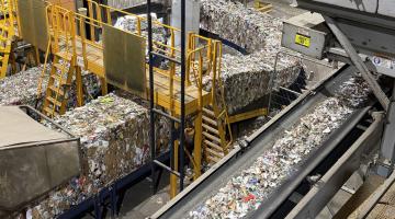A line of sorted waste in a recycling facility