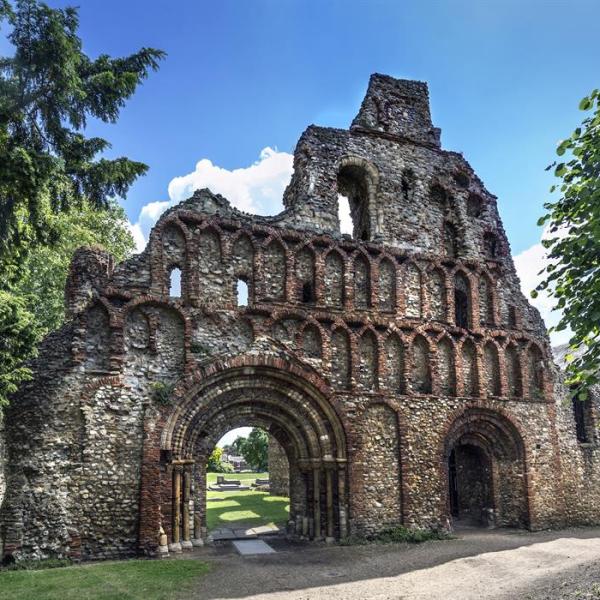 Photo of St Botolph's Priory in Colchester on a sunny day