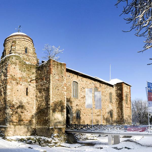Colchester Castle in the snow on a clear sunny day