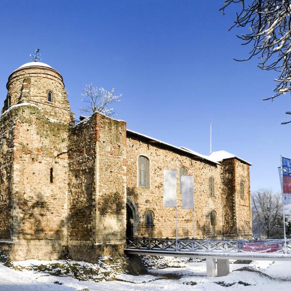 Colchester Castle in the snow on a clear sunny day