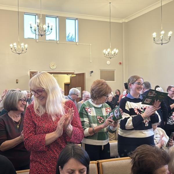 Guests singing at the Colchester Cemetery and Crematorium annual Carol Service 