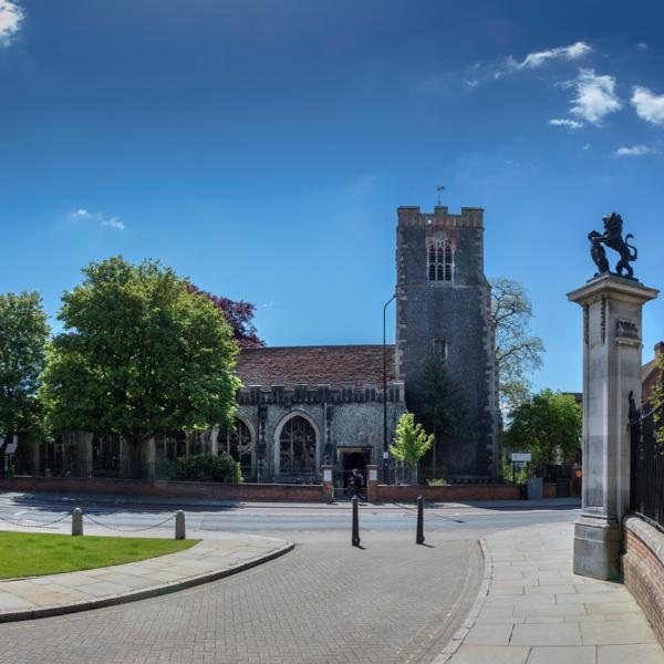 A photograph of the Natural History Museum on a bright sunny day
