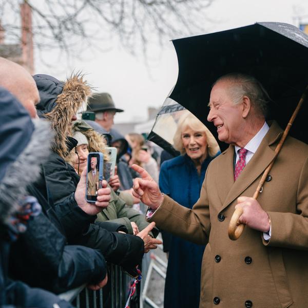 King Charles III and Queen Camilla saying hello to residents in Dedham High Street