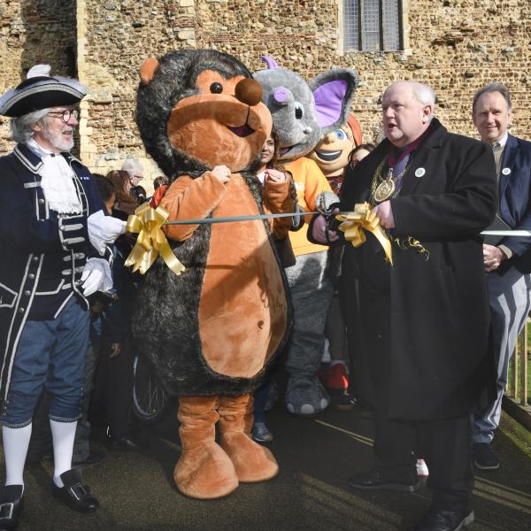The Mayor and Town Crier cutting the ribbon outside Colchester Castle at the official launch of Beat the Street