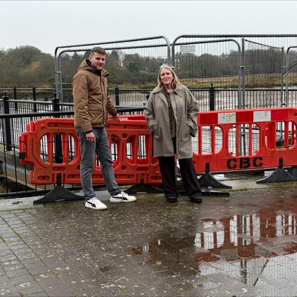 Cllr Mark Cory and Cllr Andrea Luxford Vaughan standing by Wivenhoe Jetty