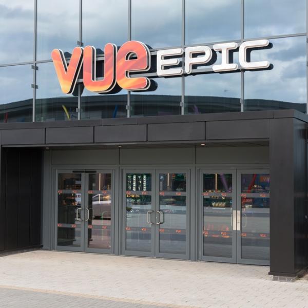 Entrance of the Vue cinema with glass frontage and VUE EPIC sign.
