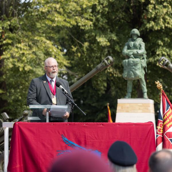 Mayor giving a speech at the unveiling of a Colchester Airborne Soldier Statue