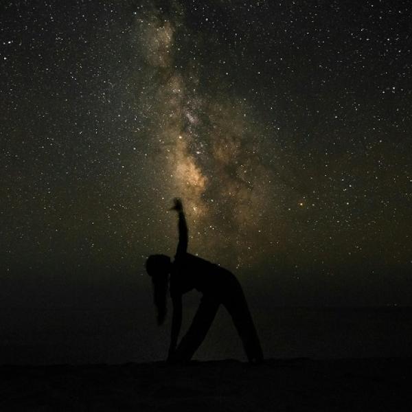 Exclusive after-hours yoga under the Gaia installation in Colchester Castle